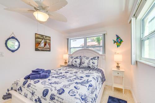 a bedroom with a bed and a ceiling fan at Hot Tub and Gas Grill Port Richey Retreat in Port Richey