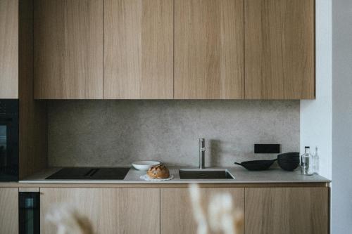 Кухня или мини-кухня в Brondstott Farm & Suites Kronplatz
