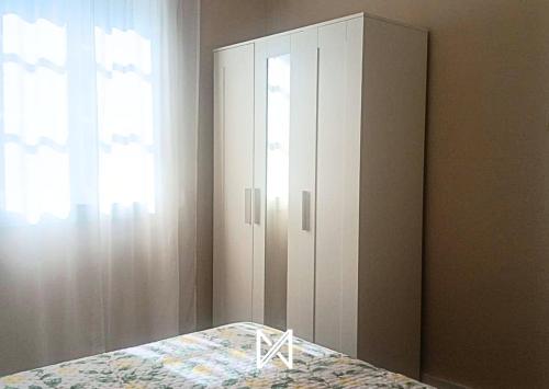 Ένα ή περισσότερα κρεβάτια σε δωμάτιο στο MyStay - Refúgio dos Sonhos