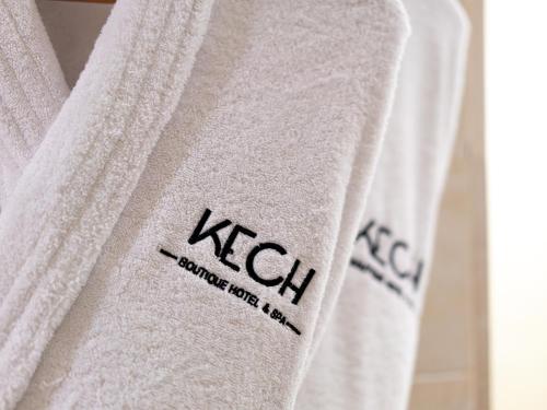 a white towel with the word kellan written on it at Kech Boutique Hotel & Spa in Marrakech