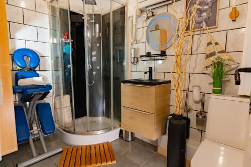 a bathroom with a shower and a sink at The retreat in Montréal