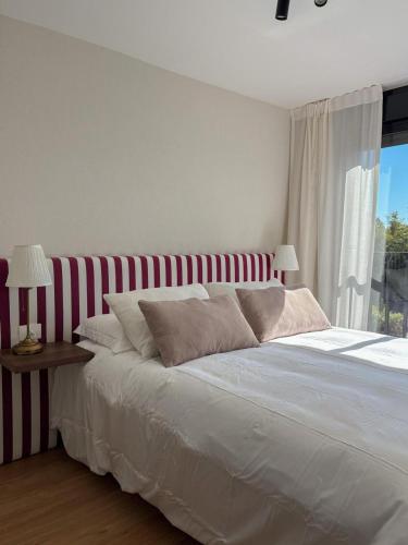Katil atau katil-katil dalam bilik di Exceptional apartment 4 minutes from Carrasco Airport