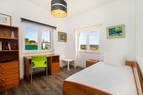 Ένα ή περισσότερα κρεβάτια σε δωμάτιο στο WHome Sea Breeze House with Pool & BBQ in Ericeira