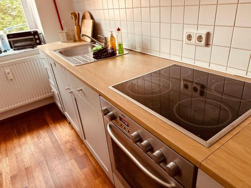 Kuchyň nebo kuchyňský kout v ubytování Moderne Wohnung in Eberswalde