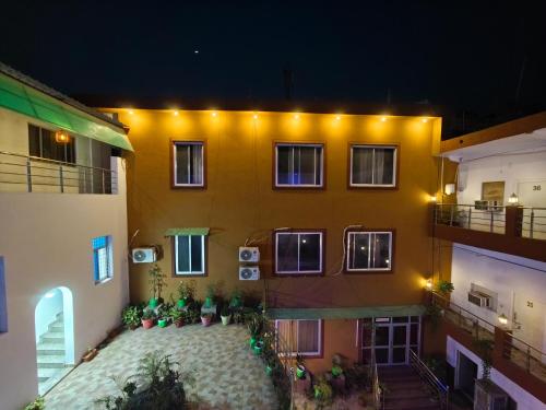 an overhead view of a building at night at Raj Hotel - Since 1960 in Sultānpur
