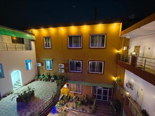 an overhead view of a building at night at Raj Hotel - Since 1960 in Sultānpur
