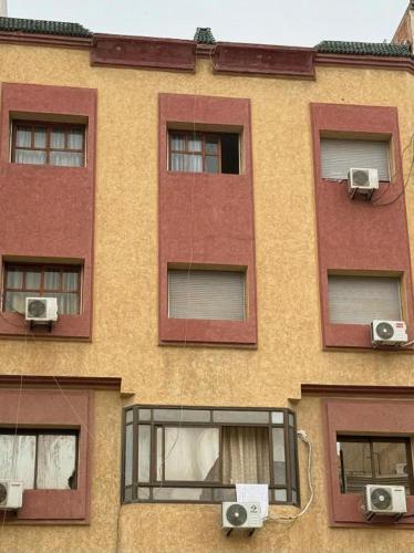 a building with three windows and two speakers at residence kawtar in Meknès