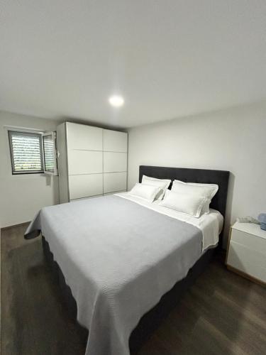 Ένα ή περισσότερα κρεβάτια σε δωμάτιο στο Apartment Mia