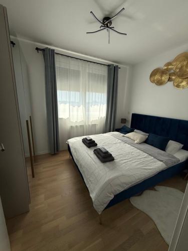 Postel nebo postele na pokoji v ubytování VG CITY STAY - airport & city