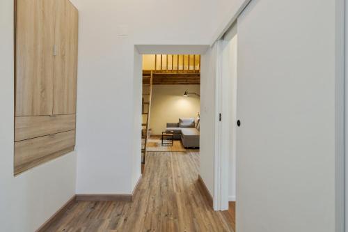 En eller flere senge i et værelse på Palmela Oásis Apartment II