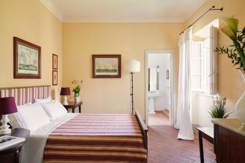Ένα ή περισσότερα κρεβάτια σε δωμάτιο στο Villa Pedone