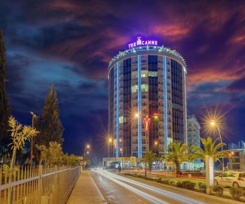 a building with a neon sign on top of it at Luxury Apartment Valentina in Budva