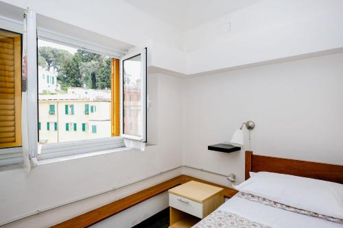 Postel nebo postele na pokoji v ubytování Hotel Caffaro