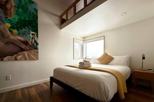 En eller flere senge i et værelse på Chalet aux ℳille et une vues