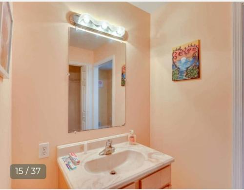 a bathroom with a sink and a mirror at 538) Massive 2 bedroom sleeps 12 in Harrisburg