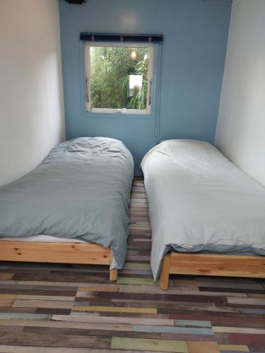 Ένα ή περισσότερα κρεβάτια σε δωμάτιο στο Chalet "In Toto"