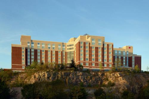 a large building on top of a mountain at Marriott Boston Quincy in Quincy