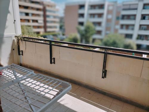a bench on the balcony of a building at Casa Malignani in Lunghezza