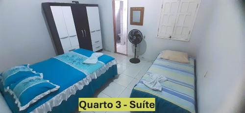 Postel nebo postele na pokoji v ubytování Casa e conforto na praia, simples e aconchegante - Mucuri, Ba