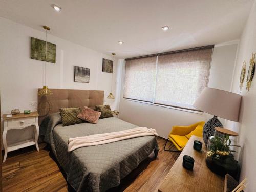 a bedroom with a bed and a window at Smp BLING BLING in Toulon