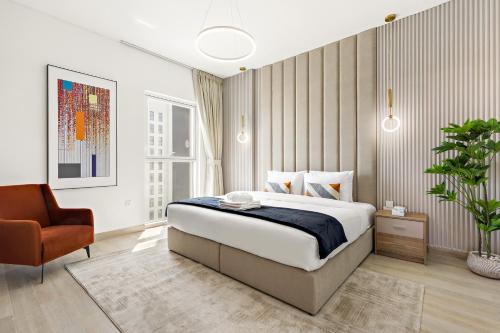 Ein Bett oder Betten in einem Zimmer der Unterkunft Desert Key - Perfectly Located Yas Island Premier Apts