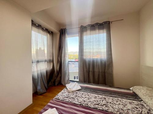 Ένα ή περισσότερα κρεβάτια σε δωμάτιο στο LUSH Central Penthouses - Eluxory Apts