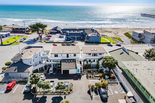 an aerial view of a house next to the beach at 2 Coastal Studios at Cayucus Beach Access Ocean Views in Cayucos