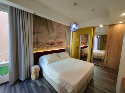 Una cama o camas en una habitación de Design Hotel Astra B&B