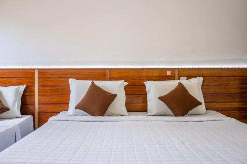 Ένα ή περισσότερα κρεβάτια σε δωμάτιο στο Jeri Village Hotel