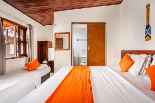 Ένα ή περισσότερα κρεβάτια σε δωμάτιο στο Jeri Village Hotel