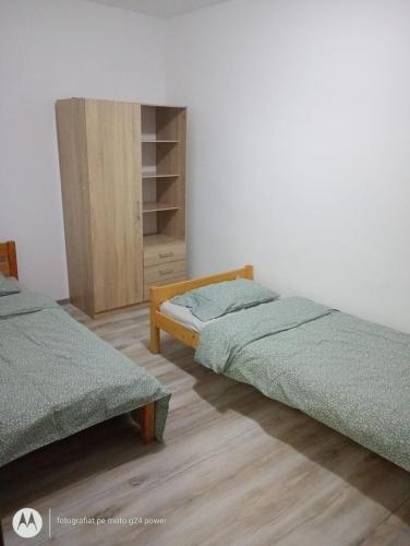 Ліжко або ліжка в номері 4 Rooms Apartment