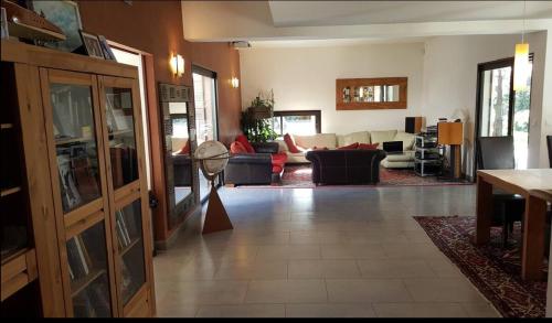 Χώρος καθιστικού στο Villa avec piscine et dépendance