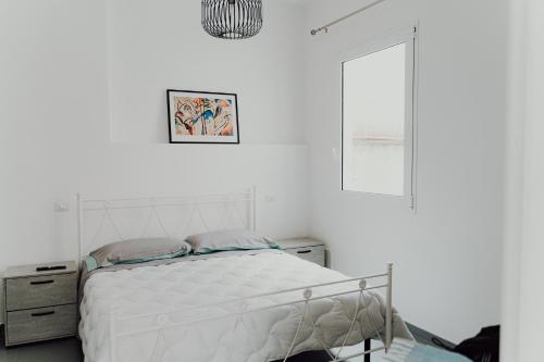 Una cama o camas en una habitación de Cincin Casa