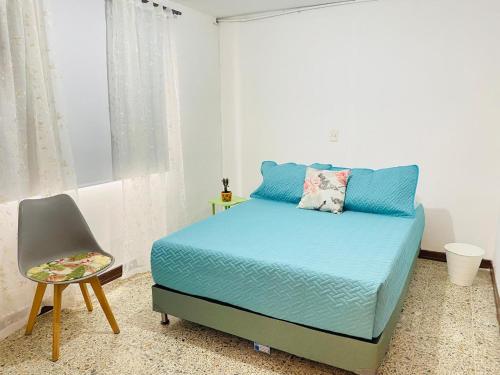 Postel nebo postele na pokoji v ubytování Casa de las Flores en Medellín