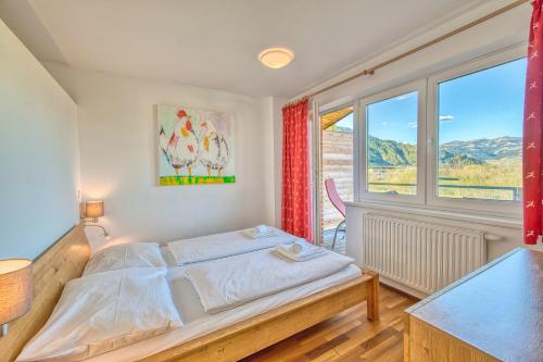 Ένα ή περισσότερα κρεβάτια σε δωμάτιο στο Residence Alpin 8