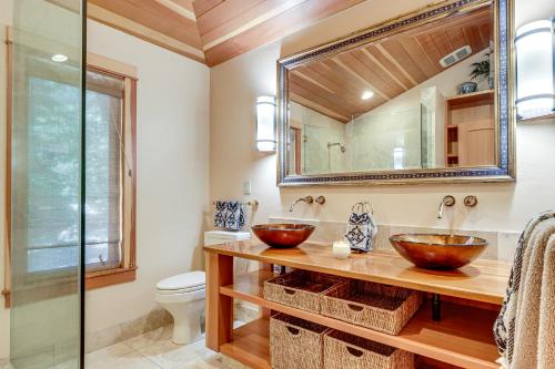 two sinks in a bathroom with a mirror at 11 Mi to Downtown Napa Wine Country Cottage in Napa
