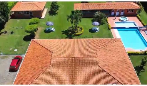 an aerial view of a house with an orange roof at finca el eden ginebra valle in Ginebra