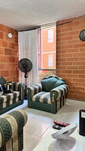 Χώρος καθιστικού στο Habitacion Brisas Ricaurte