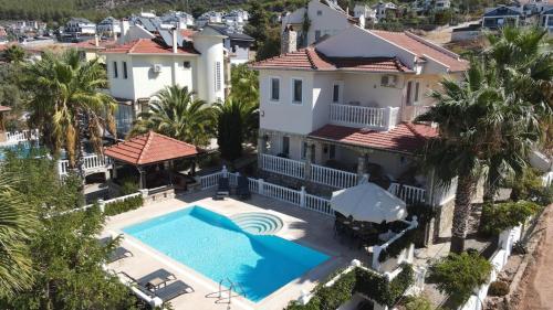 an aerial view of a house with a swimming pool at Villa Belle ,Fethiye in Fethiye