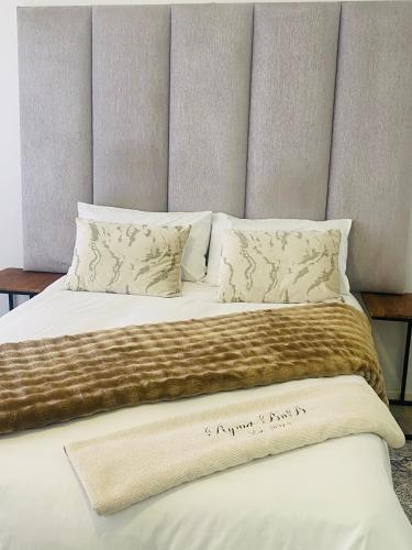 Ένα ή περισσότερα κρεβάτια σε δωμάτιο στο Bay Family Nest