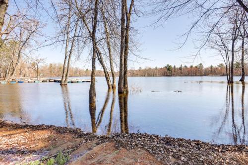 a view of a lake with trees and water at Walk to Private Beach and Boat Launch Mayfield Home in Broadalbin