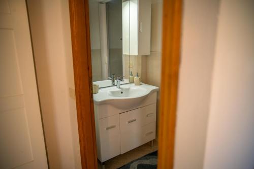 a bathroom with a sink and a mirror at L'ulivo in Levanto