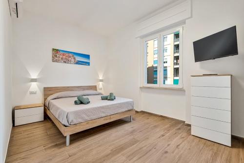 Ένα ή περισσότερα κρεβάτια σε δωμάτιο στο Luxury Apartment - Colibrì
