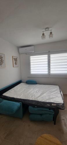 Postel nebo postele na pokoji v ubytování Apartamento cerca del Mar, Layma