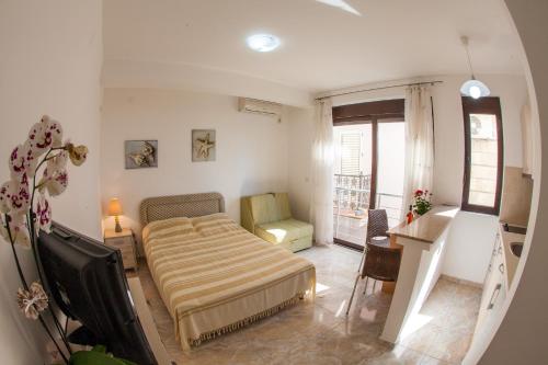 Postel nebo postele na pokoji v ubytování Apartments Lumiere