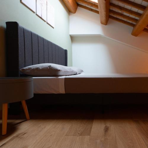 a bedroom with a bed in a room at Antica Corte Lugo in Lugo
