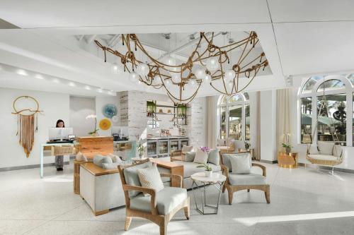a large living room with a chandelier at Marriott Vacation Club, South Beach in Miami Beach