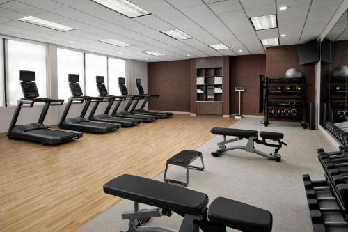 a gym with rows of chairs in a room at Courtyard by Marriott Dallas DFW Airport North/Grapevine in Grapevine