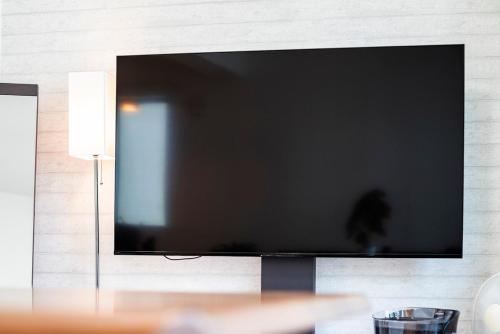 ELM Villa 札幌中心部 観光に最適 一軒家 駐車場完備にあるテレビまたはエンターテインメントセンター