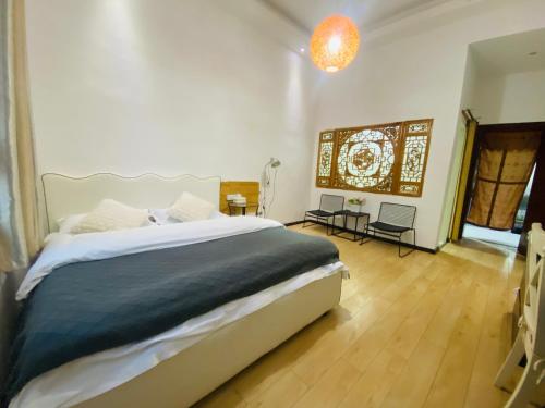 Katil atau katil-katil dalam bilik di Shangri-La Chudengshuo Homestay楚登硕民宿